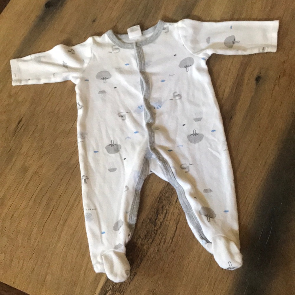 Baby boy onesie. Dinosaur, tree and rain cloud print.